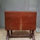 Drop-leaf table called get leg