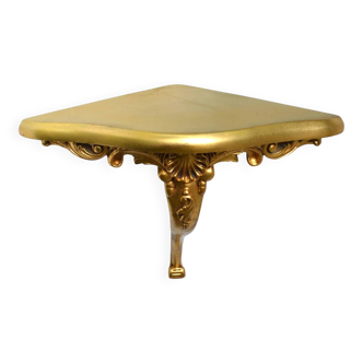 Étagère d'angle murale dorée