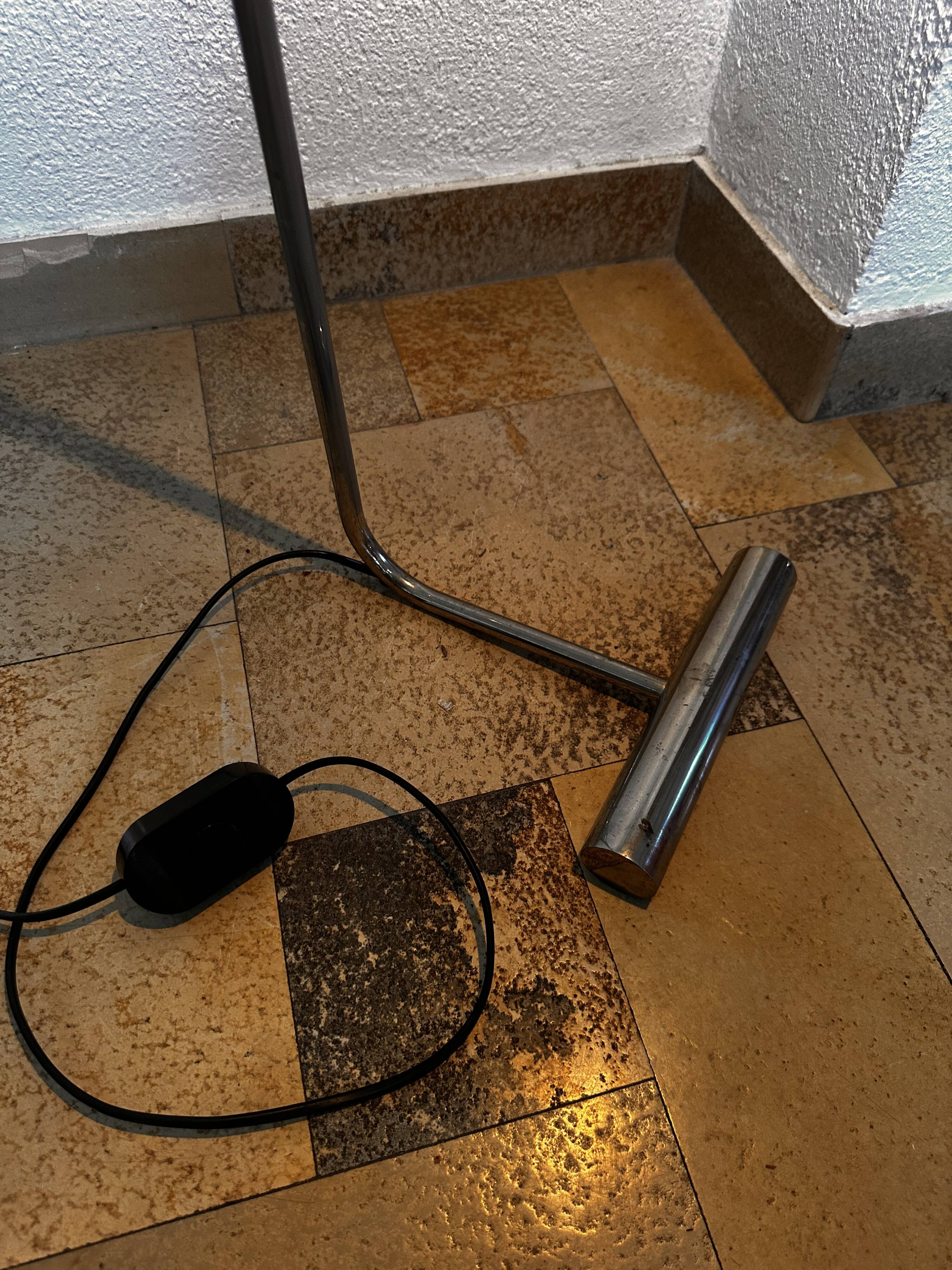 Chromed metal floor lamp designed by Christian Liaigre