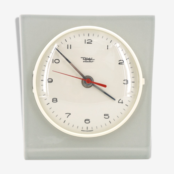 Diehl-branded light grey, free-form ceramic wall clock