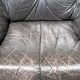 Pair of patinated leather club armchairs