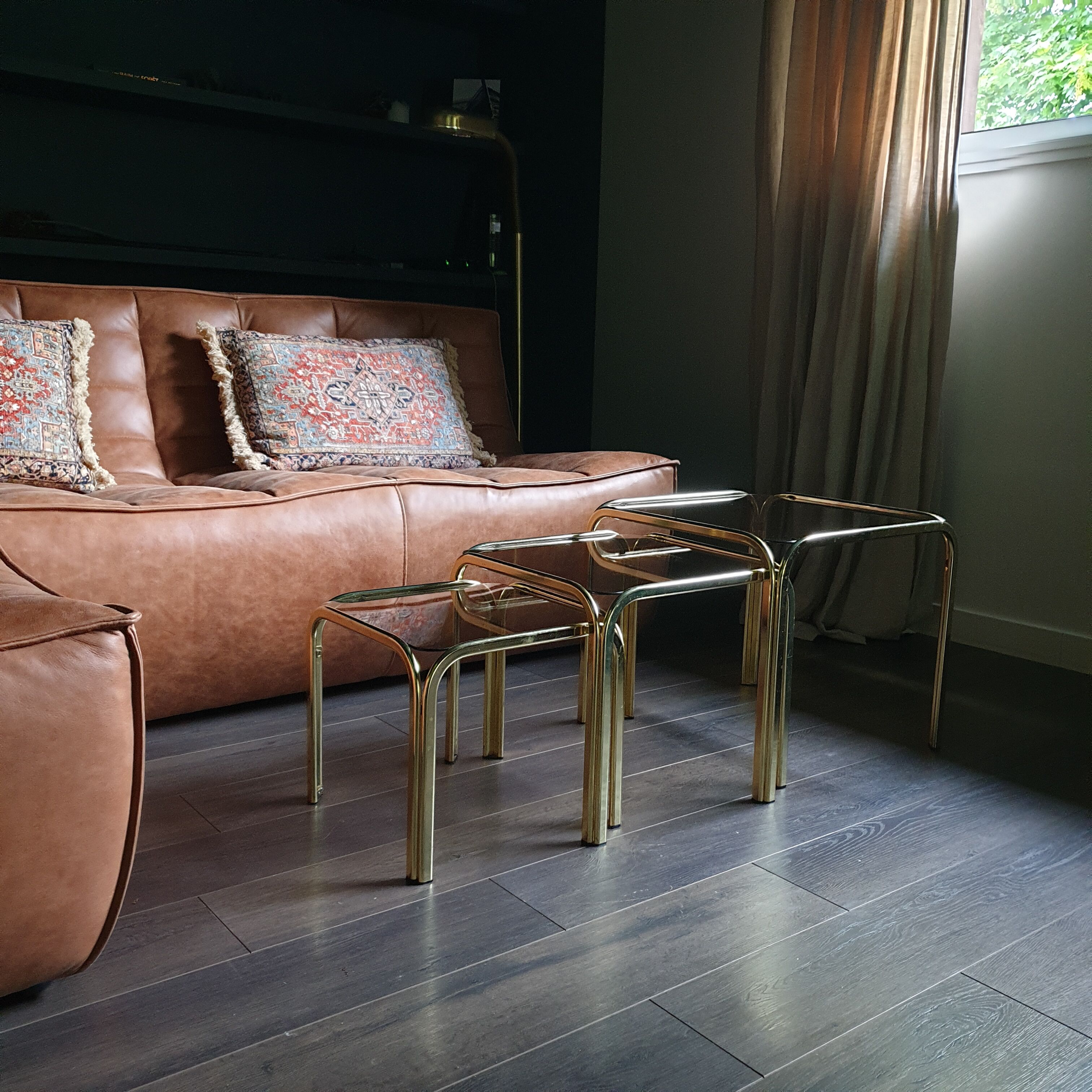 Golden vintage pull-out coffee tables and 70s smoked glass