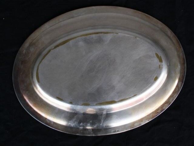 Flat oval silver metal