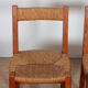 Suite de 6 chaises paillées en orme massif, travail français, 1950