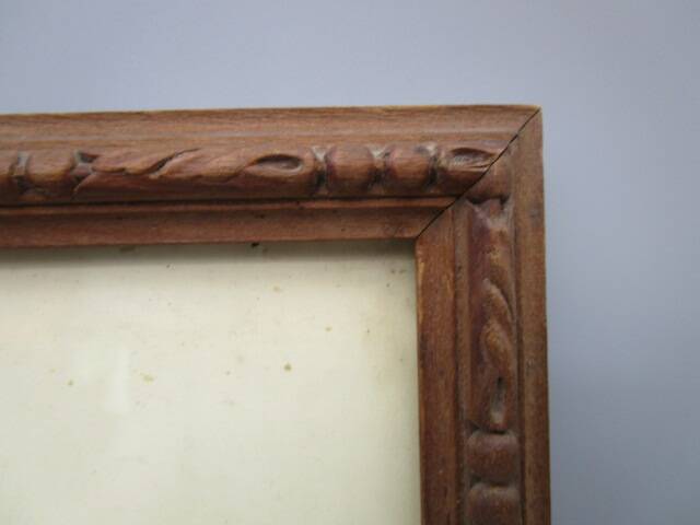 Old frame in worked wood