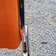 Pair of designer armchairs in orange fabrics and chrome tubes from the 70s