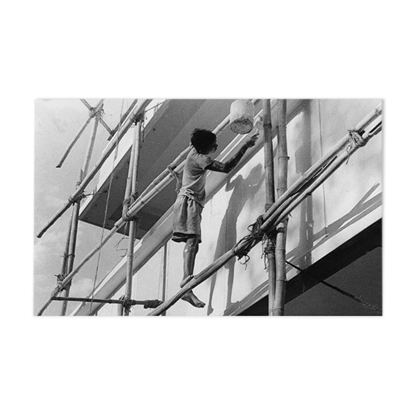 Young Indian perched on a scaffolding