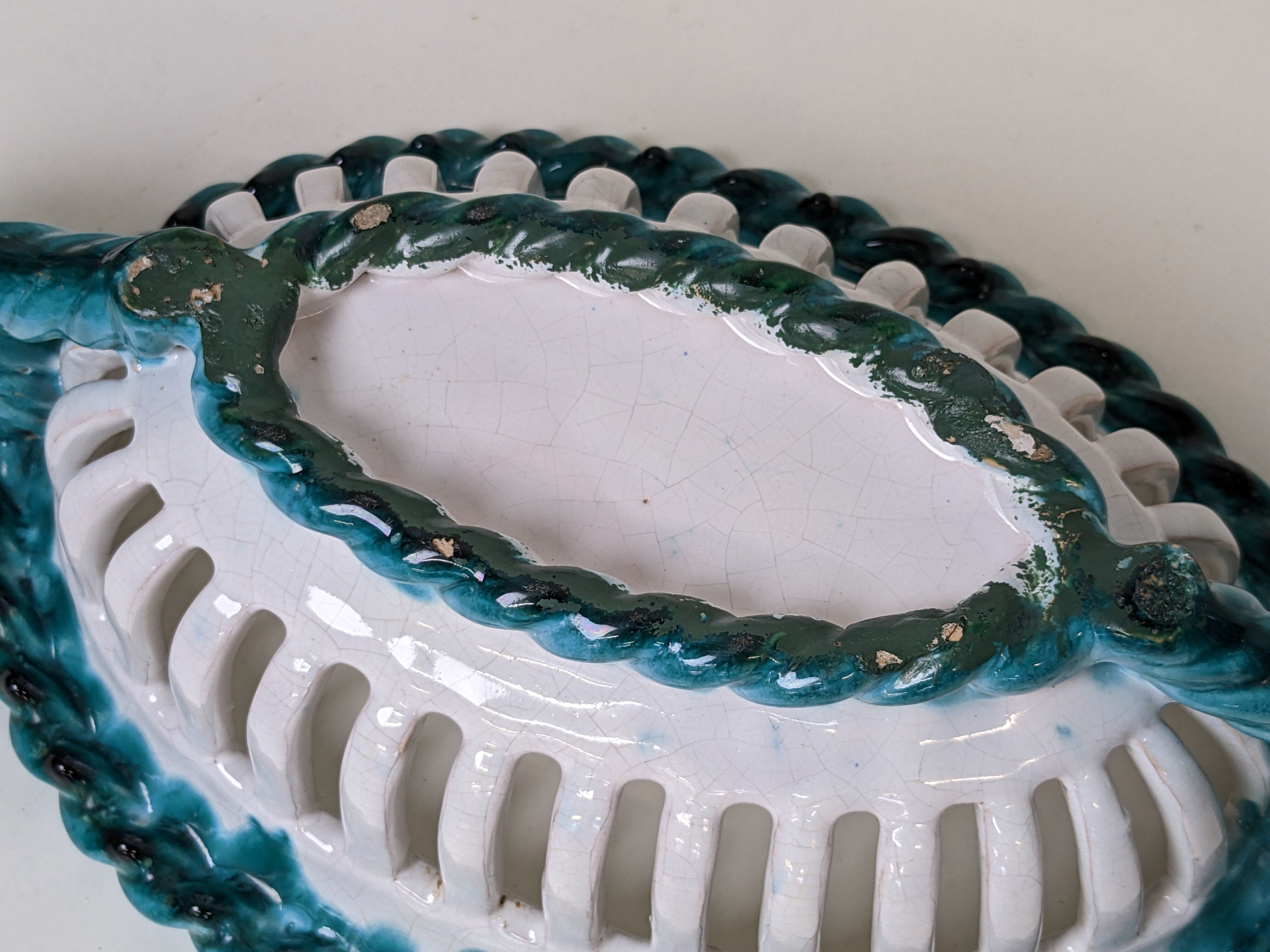 Set of 2 twisted earthenware fruit baskets by Sainte Radegonde, 50s