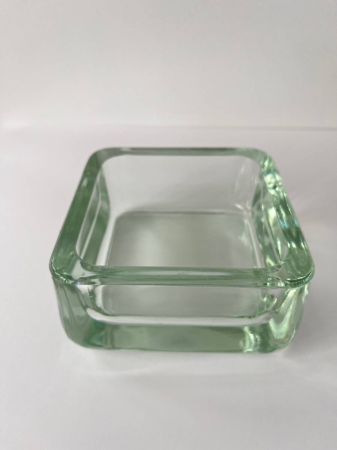 Solid square ashtray made of thick glass