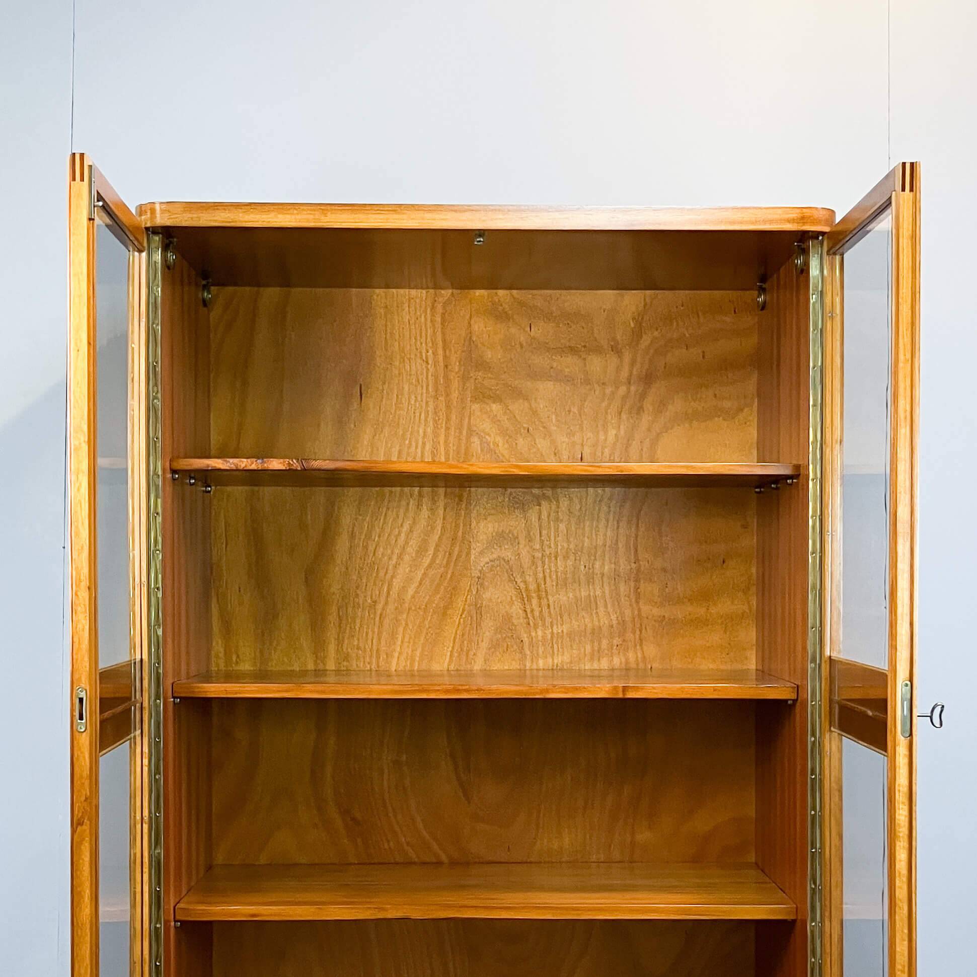 Art Deco cabinet with glass doors, various woods, 1930s