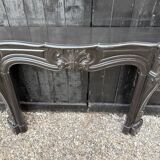Louis XV style fireplace in black Belgian marble, circa 1880.