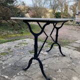 Bistro table with cast iron base, marble top, 20th century