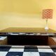 Designer coffee table in glass and chrome metal.