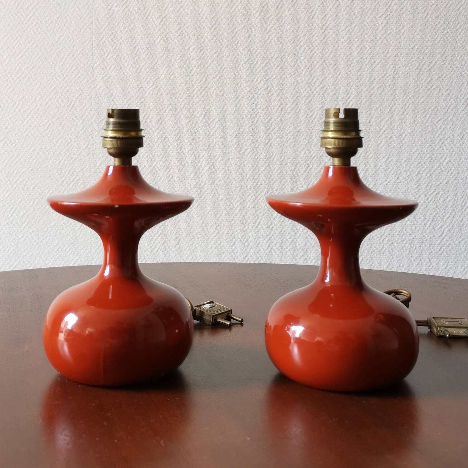 Pair of bedside lamps in lacquered turned wood