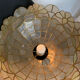Mother-of-pearl and brass suspension
