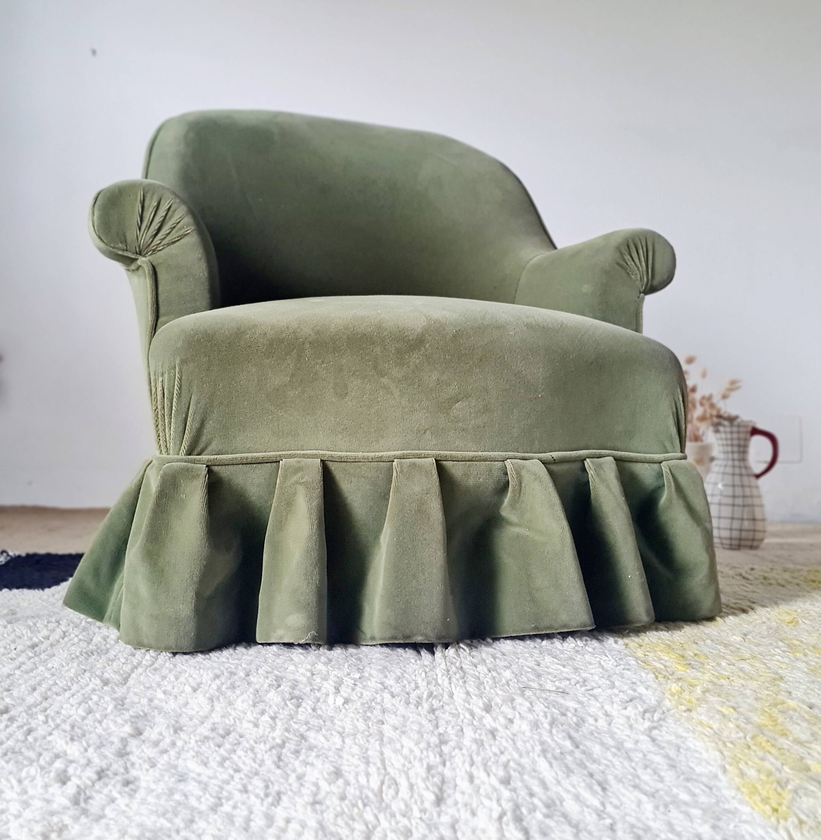 Green velvet armchair