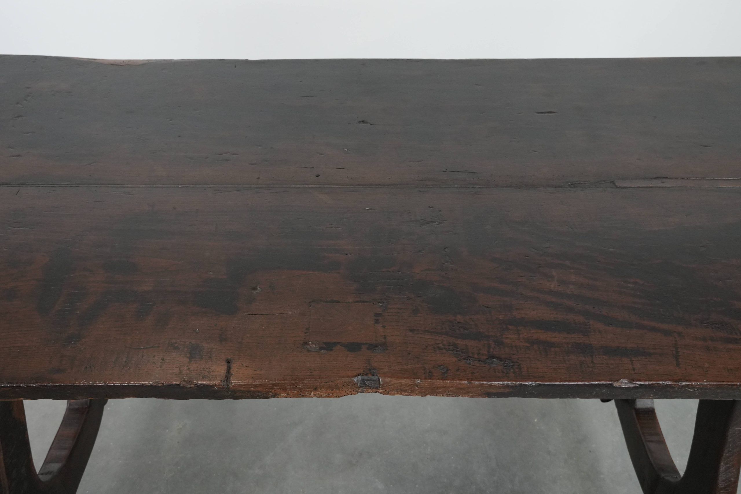 Antique Spanish table from the early 18th century with  a cast iron base