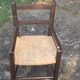 Small wooden and vintage straw children's chair Varnished wood and woven straw