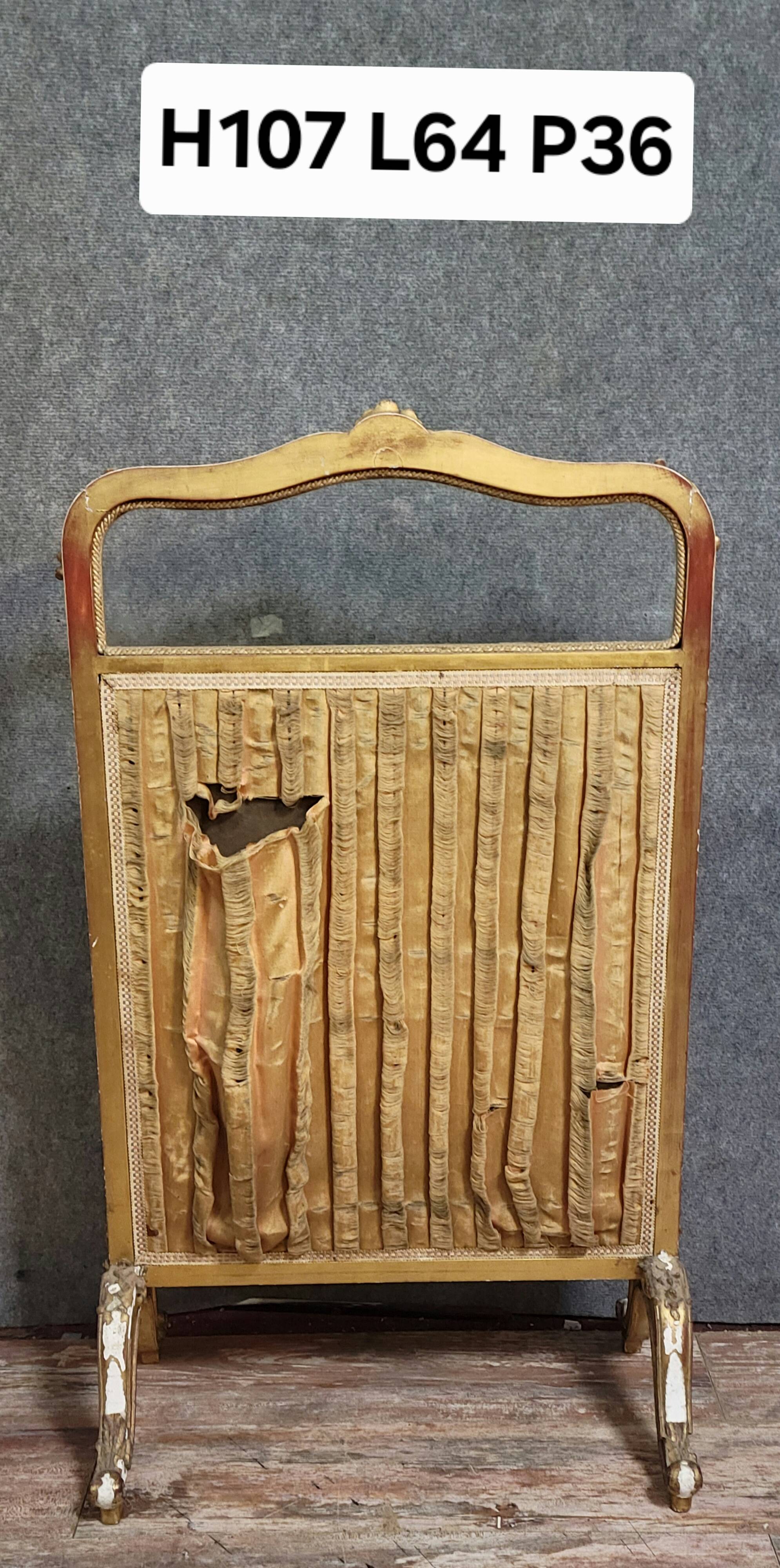 Antique Louis XV style fire screen, in carved and gilded wood, in need of restoration