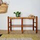 Old wooden and straw bench