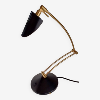 Articulated black and gold metal desk lamp