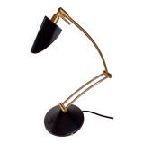 Articulated black and gold metal desk lamp