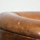Vintage sheepskin club armchair in a subtle size with warm colours