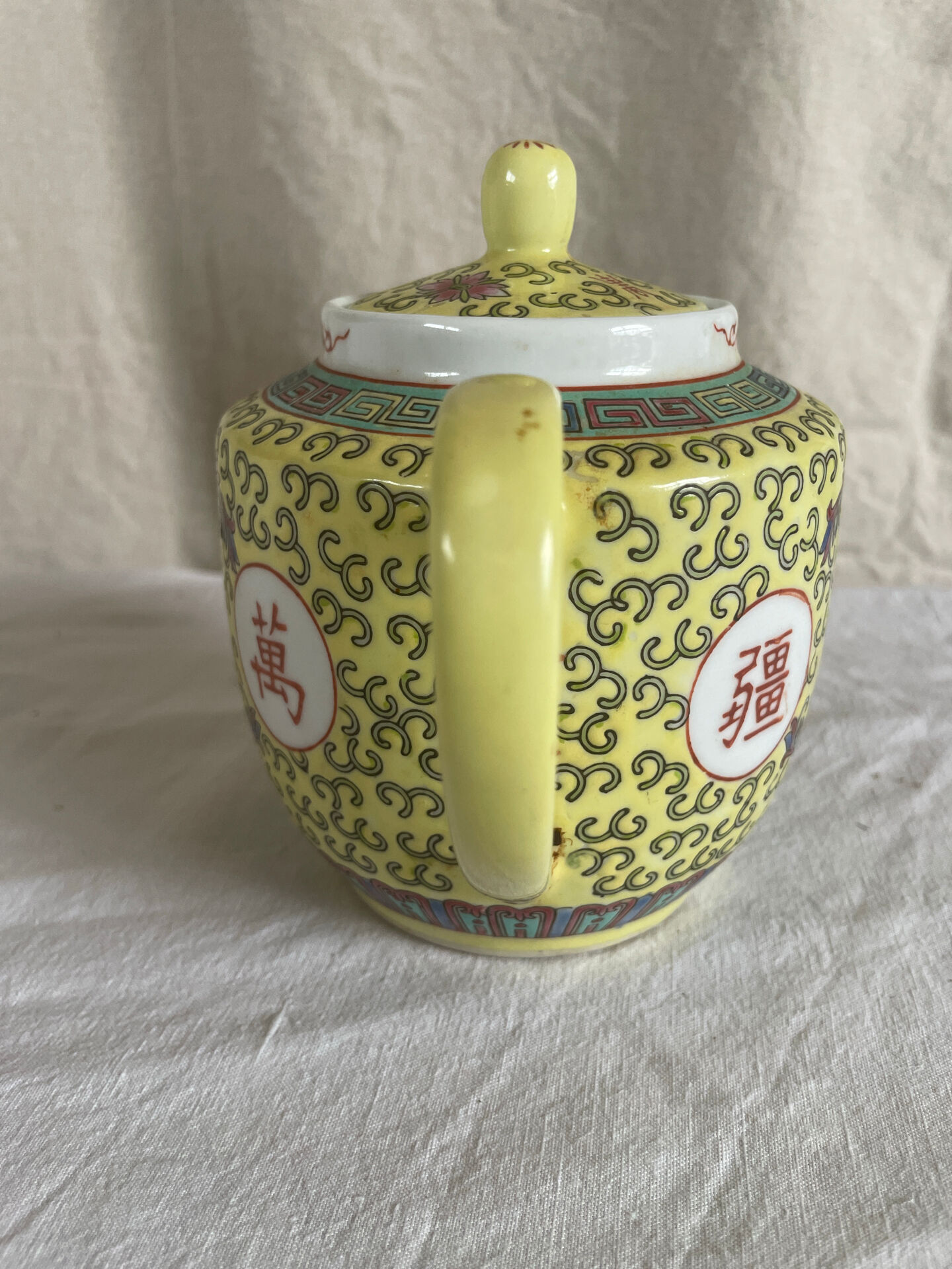 Chinese porcelain teapot with floral pattern