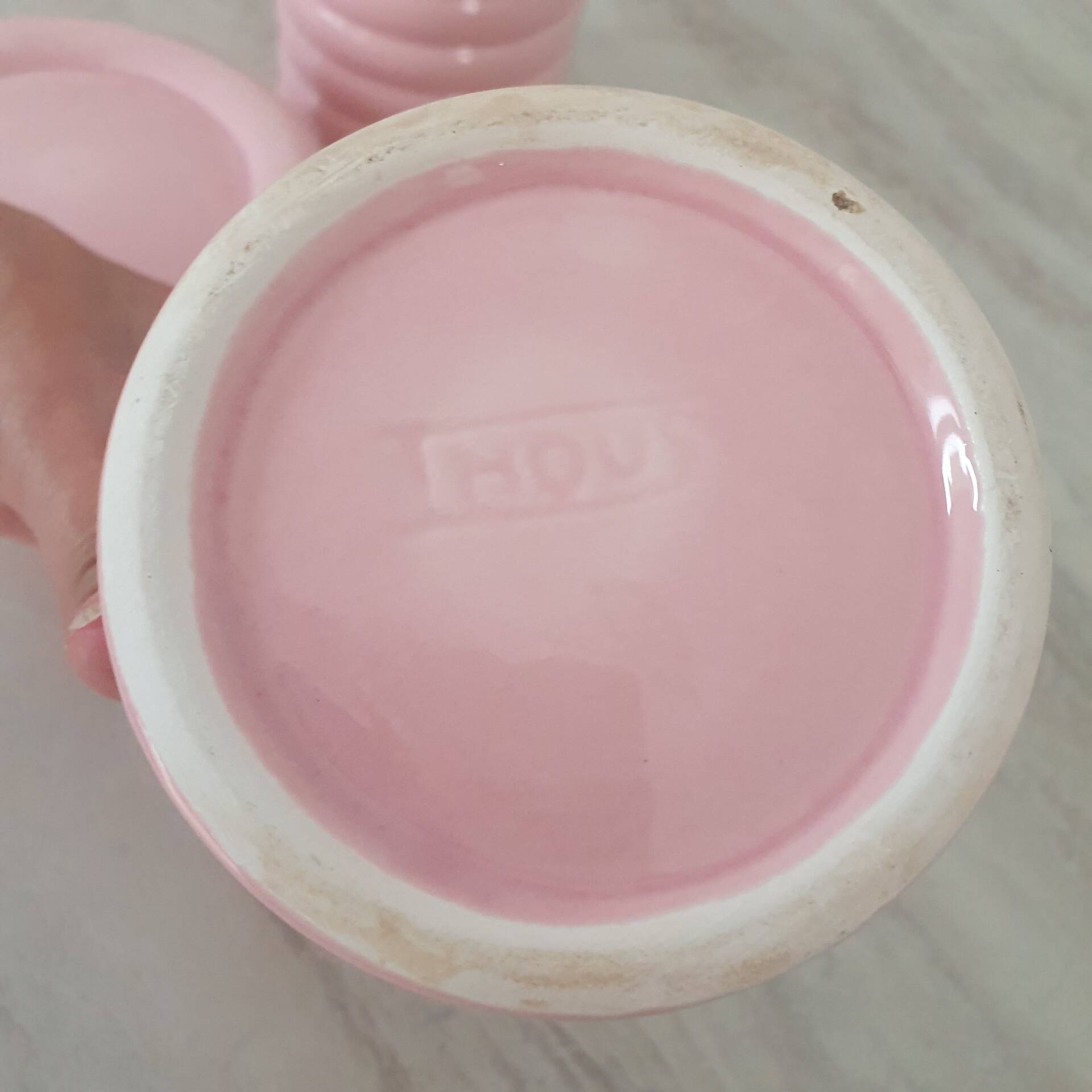 Set of pink and gold ceramic bathroom accessories