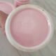 Set of pink and gold ceramic bathroom accessories