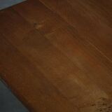 Solid oak dining table with cross base by Danish cabinetmaker, mid-20th century.