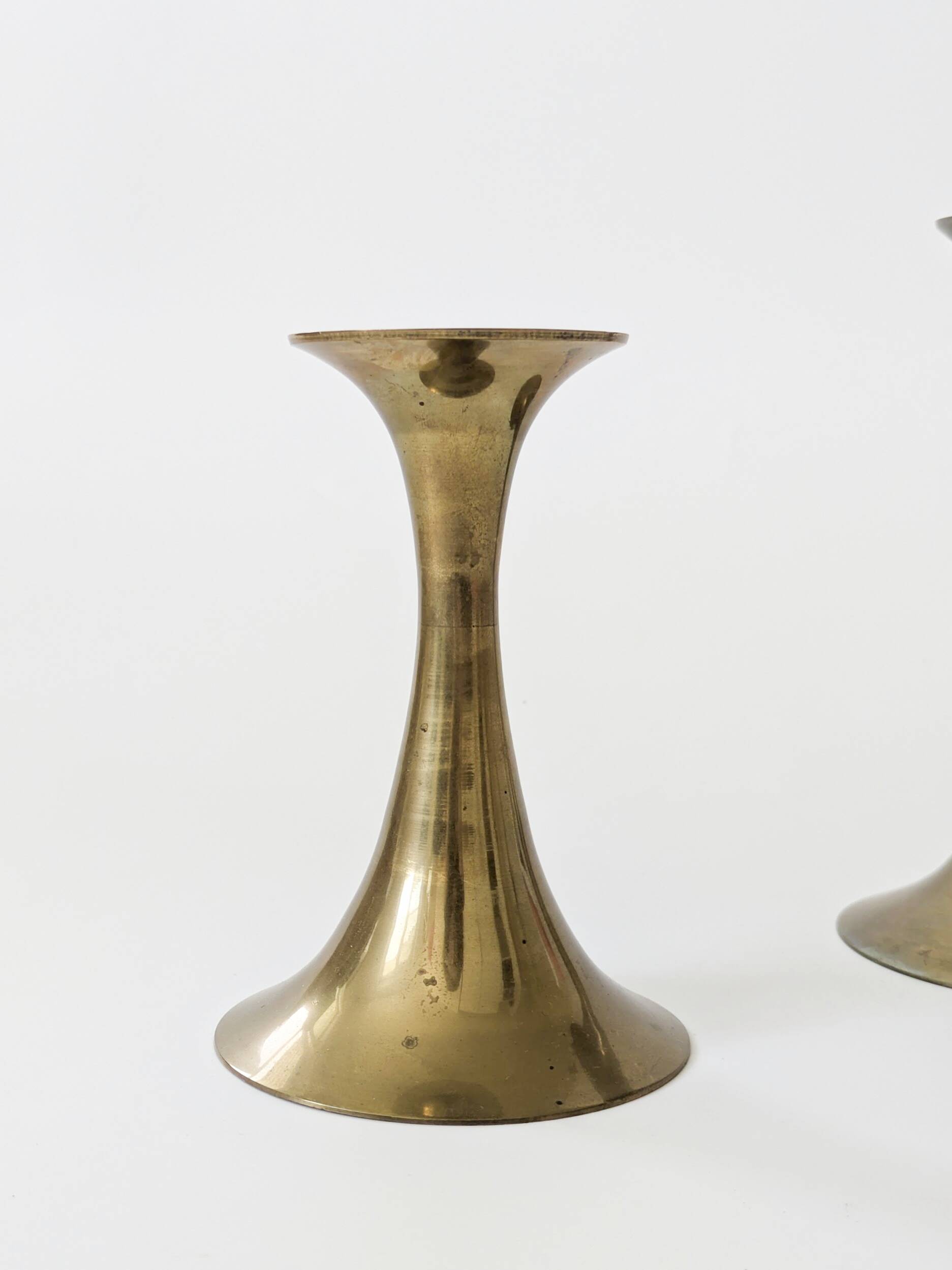 Pair of Midcentury brass candlesticks, flared shape.