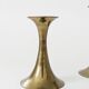 Pair of Midcentury brass candlesticks, flared shape.