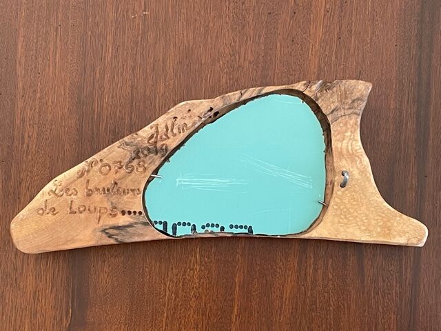Brutalist mirror made of olive wood
