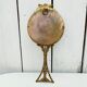 Mirror face to hand gilded bronze knot ribbon