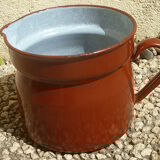 Old enameled steel pitcher