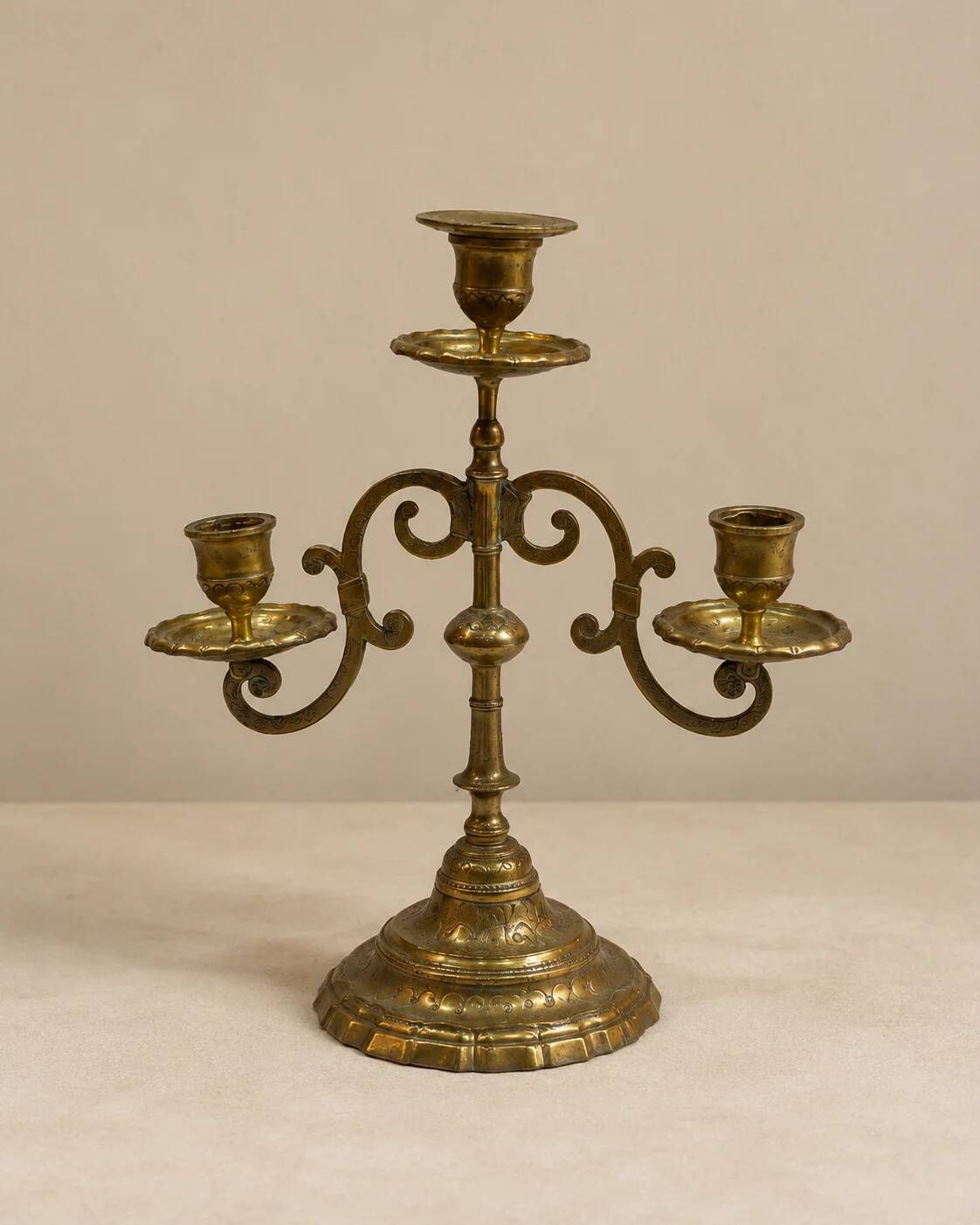 Three-light candelabrum in engraved brass — France, circa 1900
