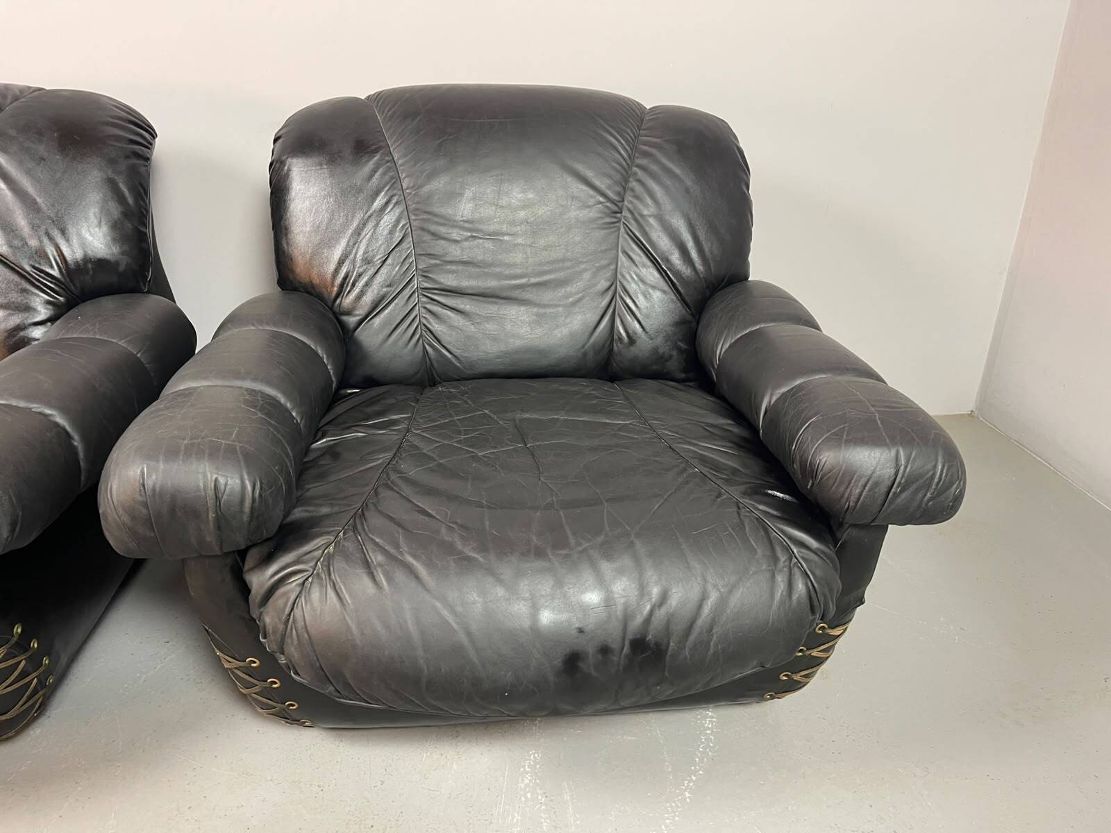 Large Set of Italian Space Age Black Leather Lounge Chairs with Brass