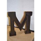 Industrial iron letter "M"