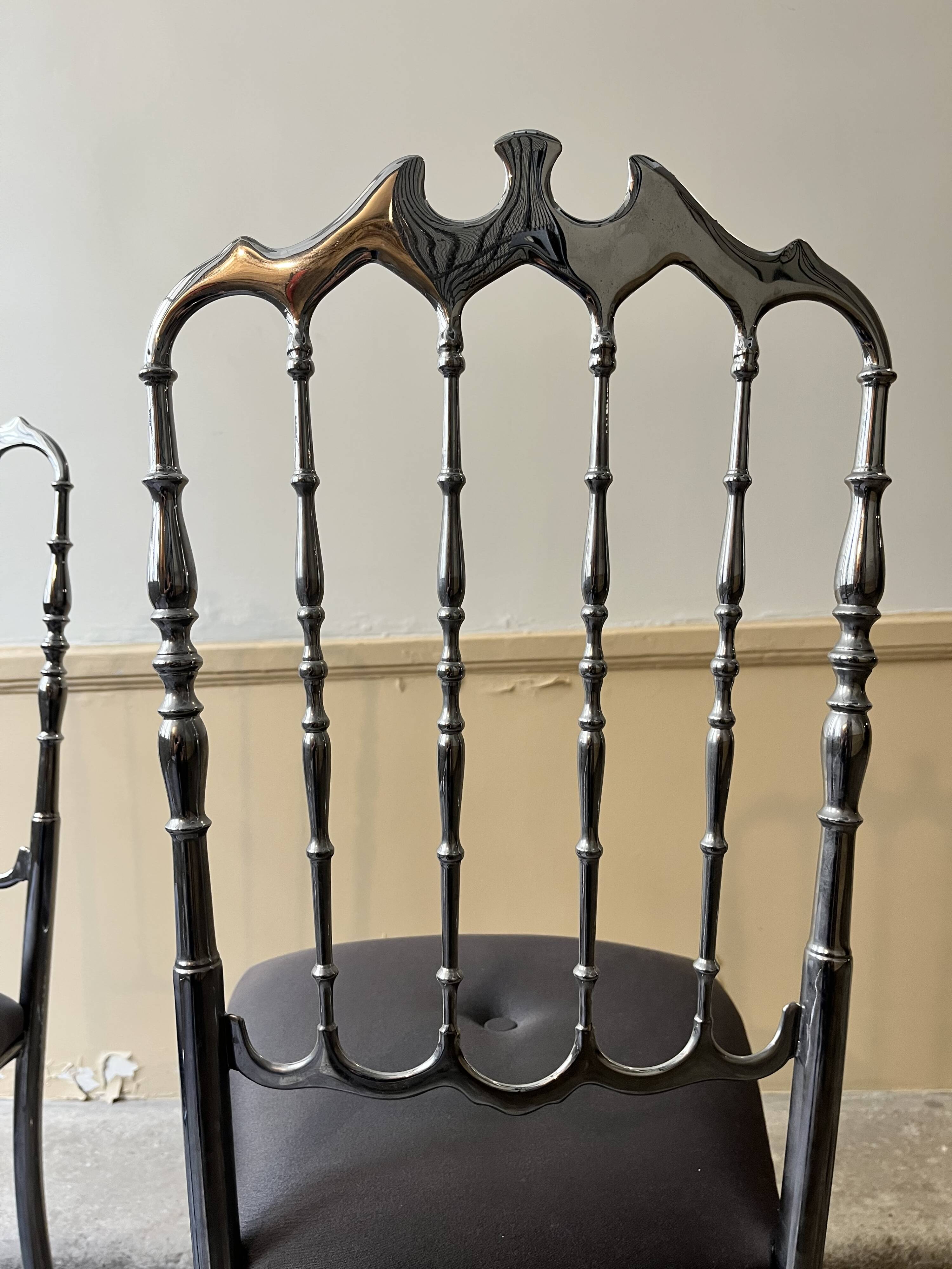 Pair of Chiavari chairs in polished mirror aluminium.