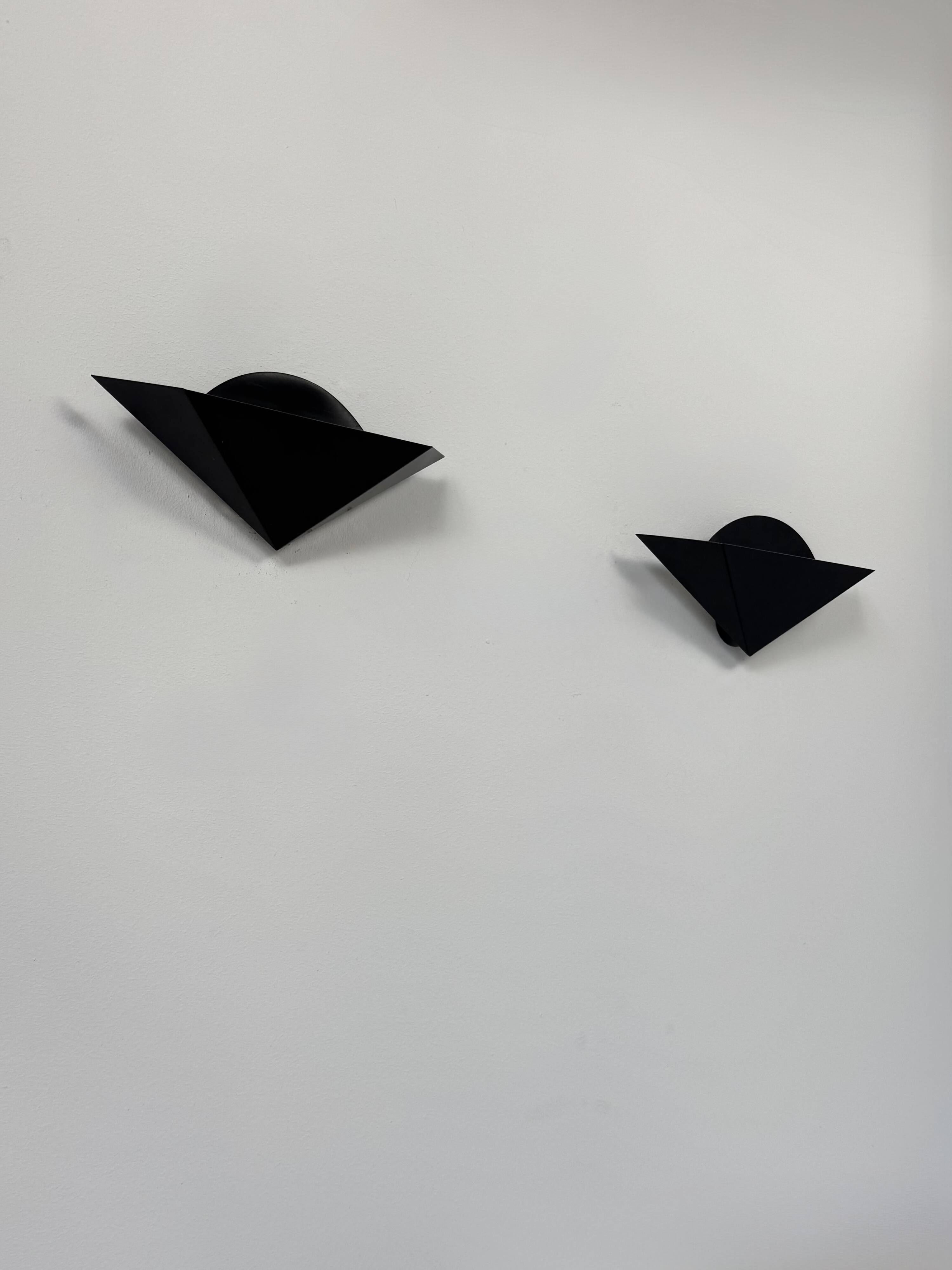 Pair of vintage wall sconces, matte black metal, France, 1970.