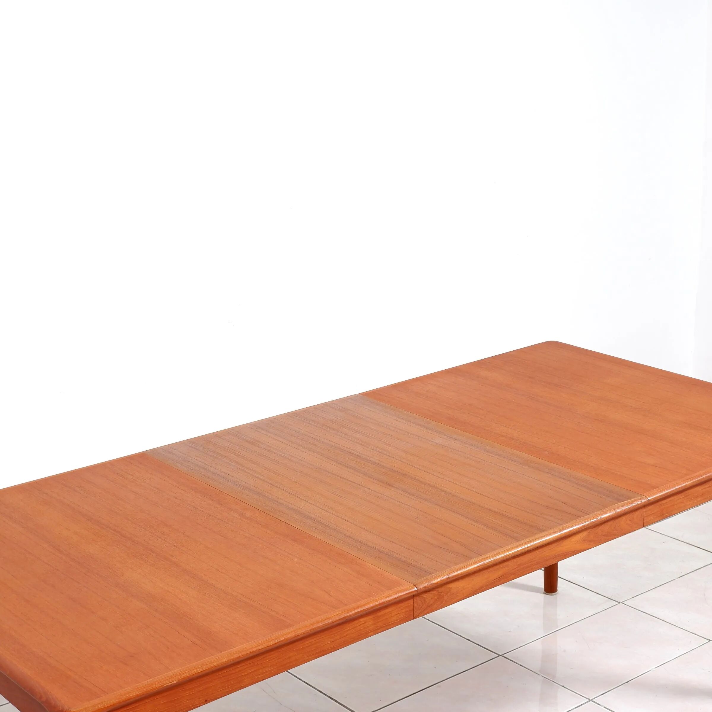 Extendable dining table in teak by H. W. Klein for Bramin Mobler