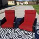 Vintage pair of red and black armchairs