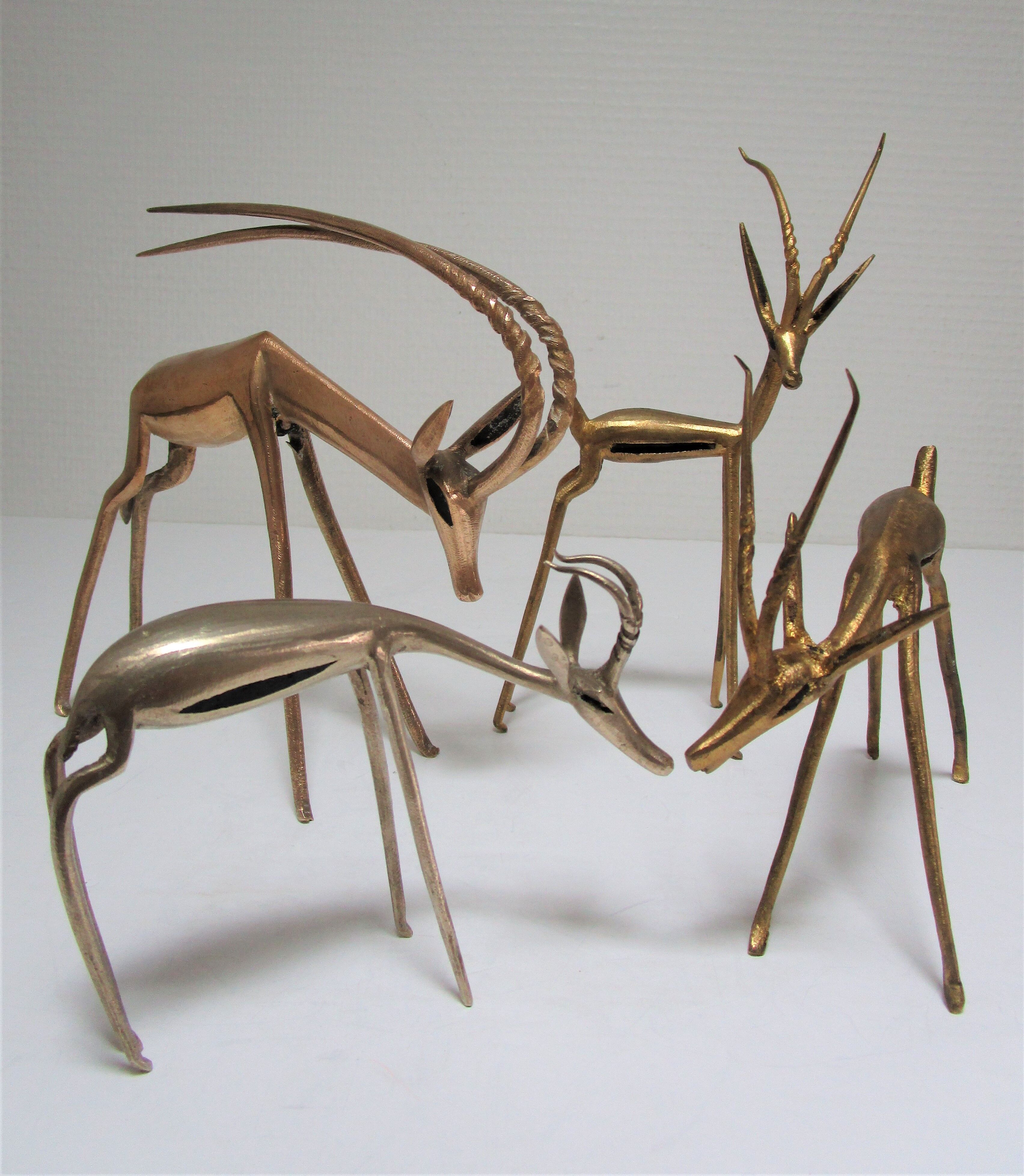 Four vintage brass antelope gazelles
