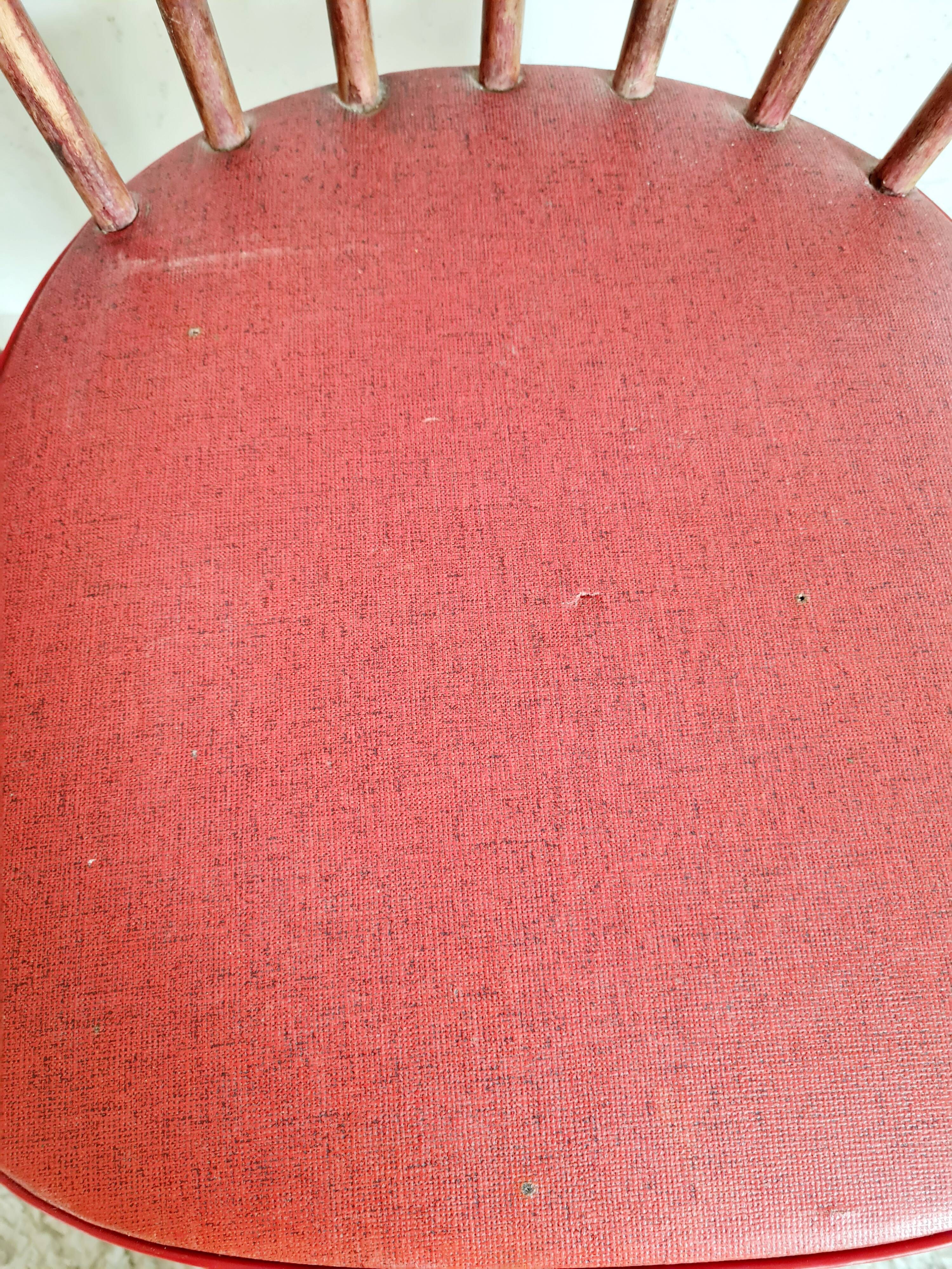 Pair of wooden bistro chairs and red imitation seating