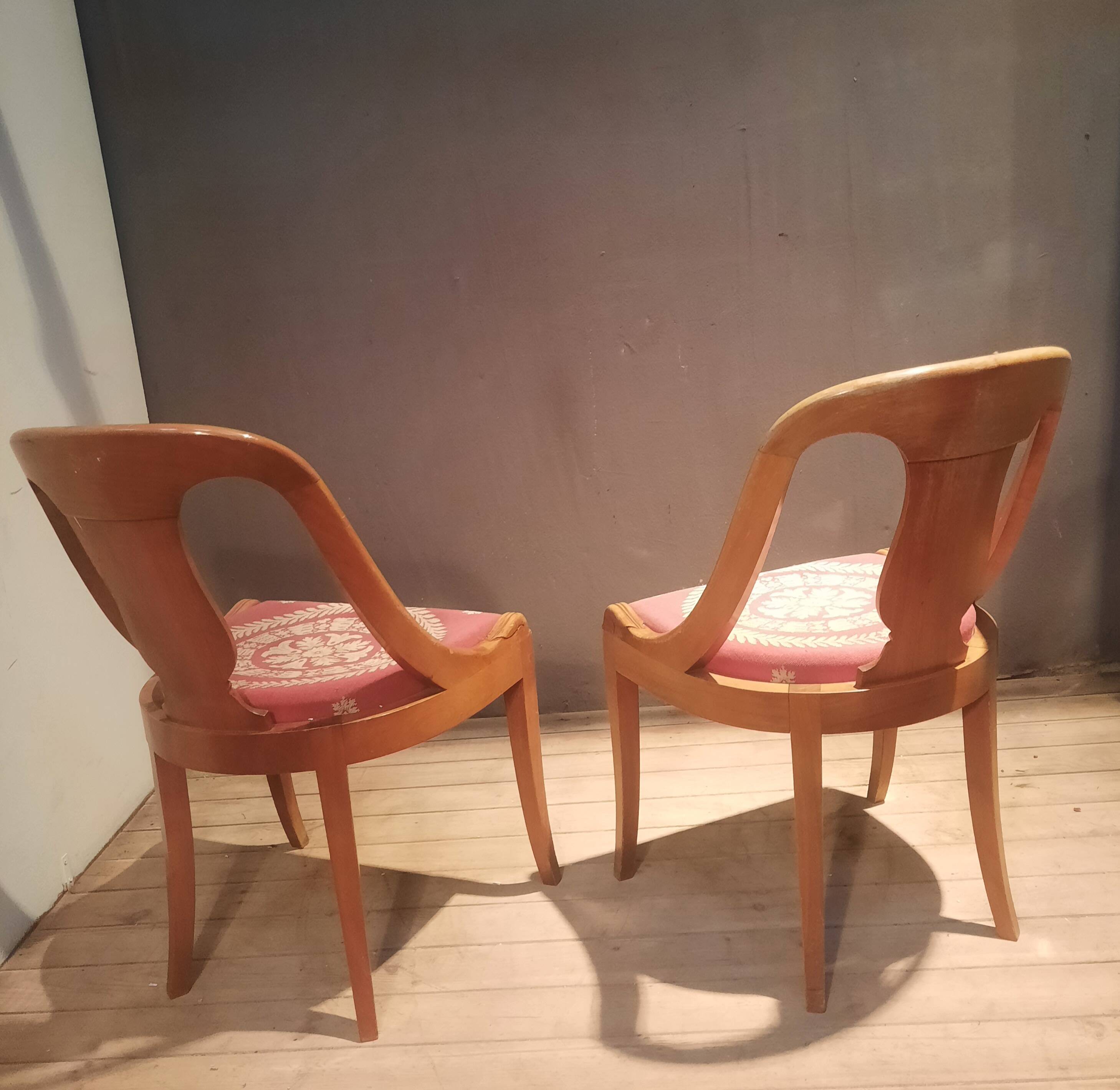 Pair of light wood gondola chairs