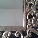 Mirror with embossed metal décor