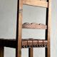 2 brutalist carved wood dining chairs with leather seat | The Netherlands | 1970s