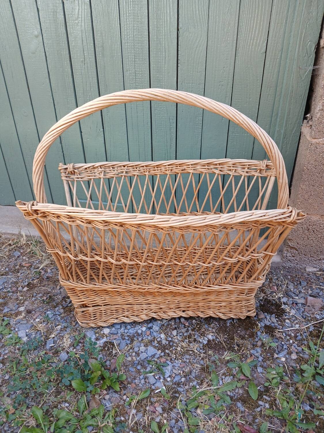 Antique wicker magazine rack