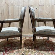 Pair of cabriole armchairs with medallion backs from the Louis XVI period, stamped OT.